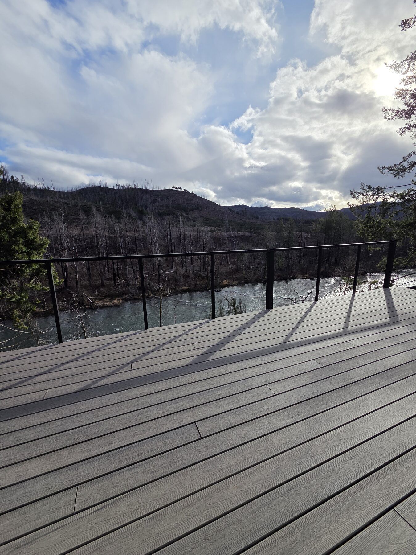 Expansive river-view deck at the Bed and Breakfast