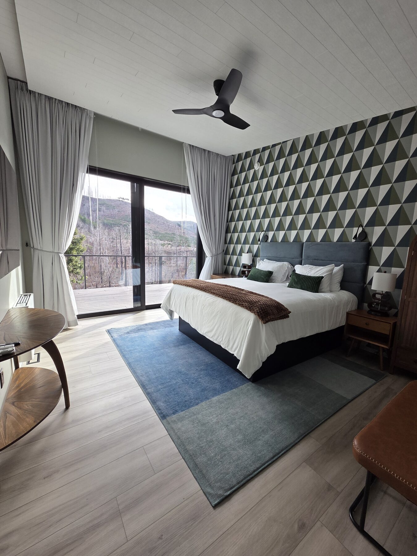 B&B suite with geometric accent wall